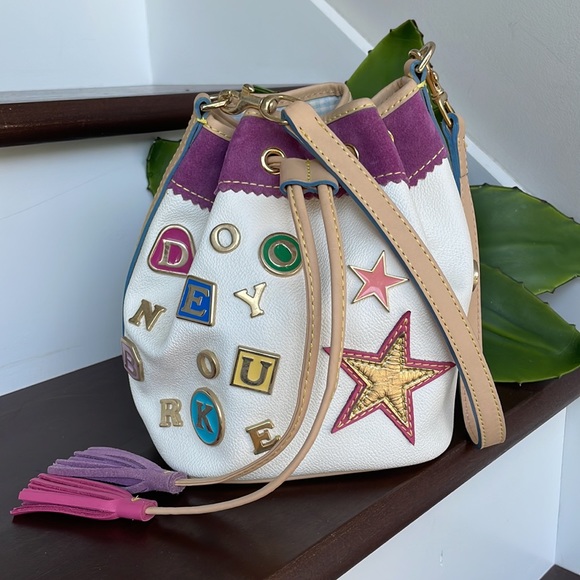 Dooney & Bourke Handbags - Dooney and Bourke drawstring bucket bag genuine leather pins handbag pur…